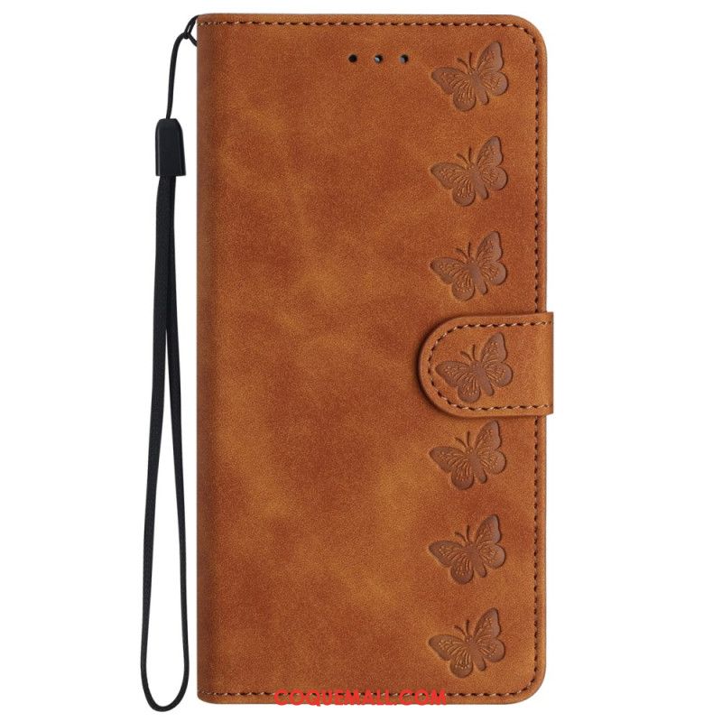 Housse iPhone 16 Frise Papillons