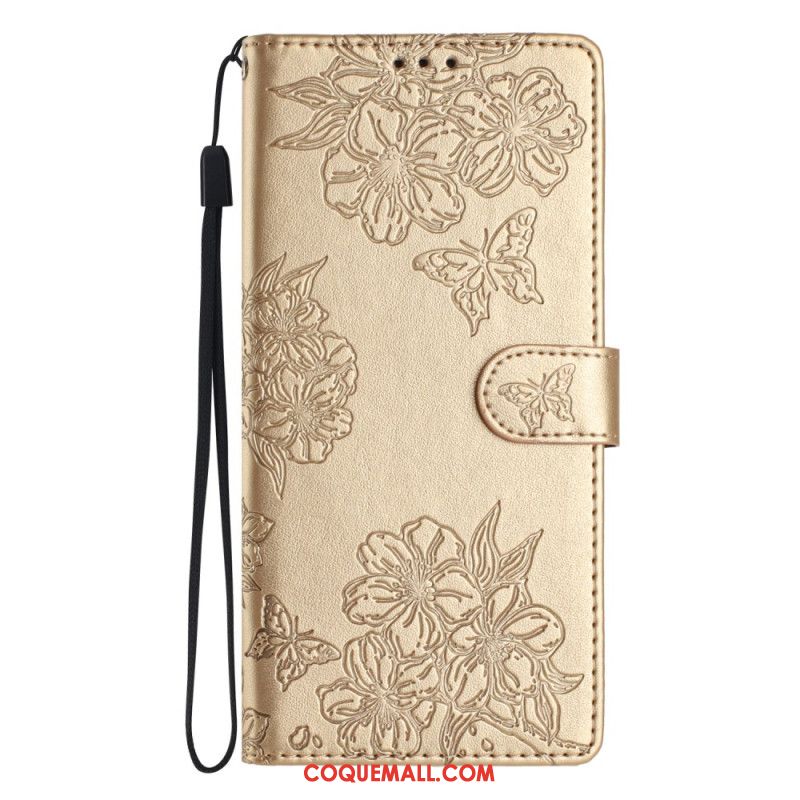 Housse iPhone 16 Motif Papillons et Fleurs