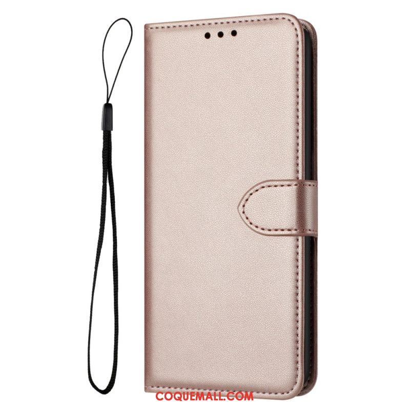 Housse iPhone 16 Plus Style Cuir Uni à Lanière